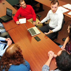 group of people sitting at a table