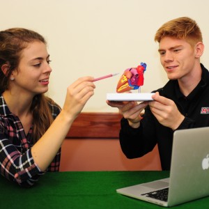 man and woman in exercise science class