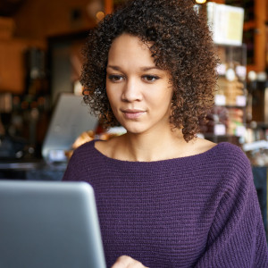 woman looking at a laptop