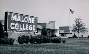 Original Malone College sign, Founder's hall in background